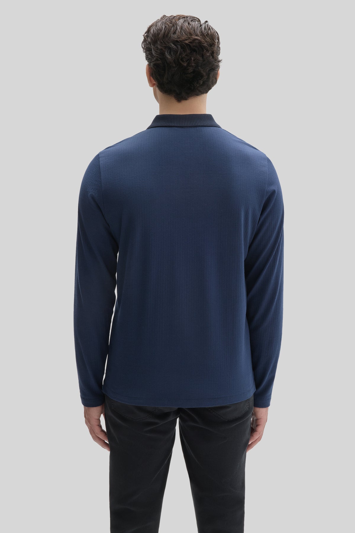 Navy long sleeve polo with ribbed collar and zip placket, shown from back view.