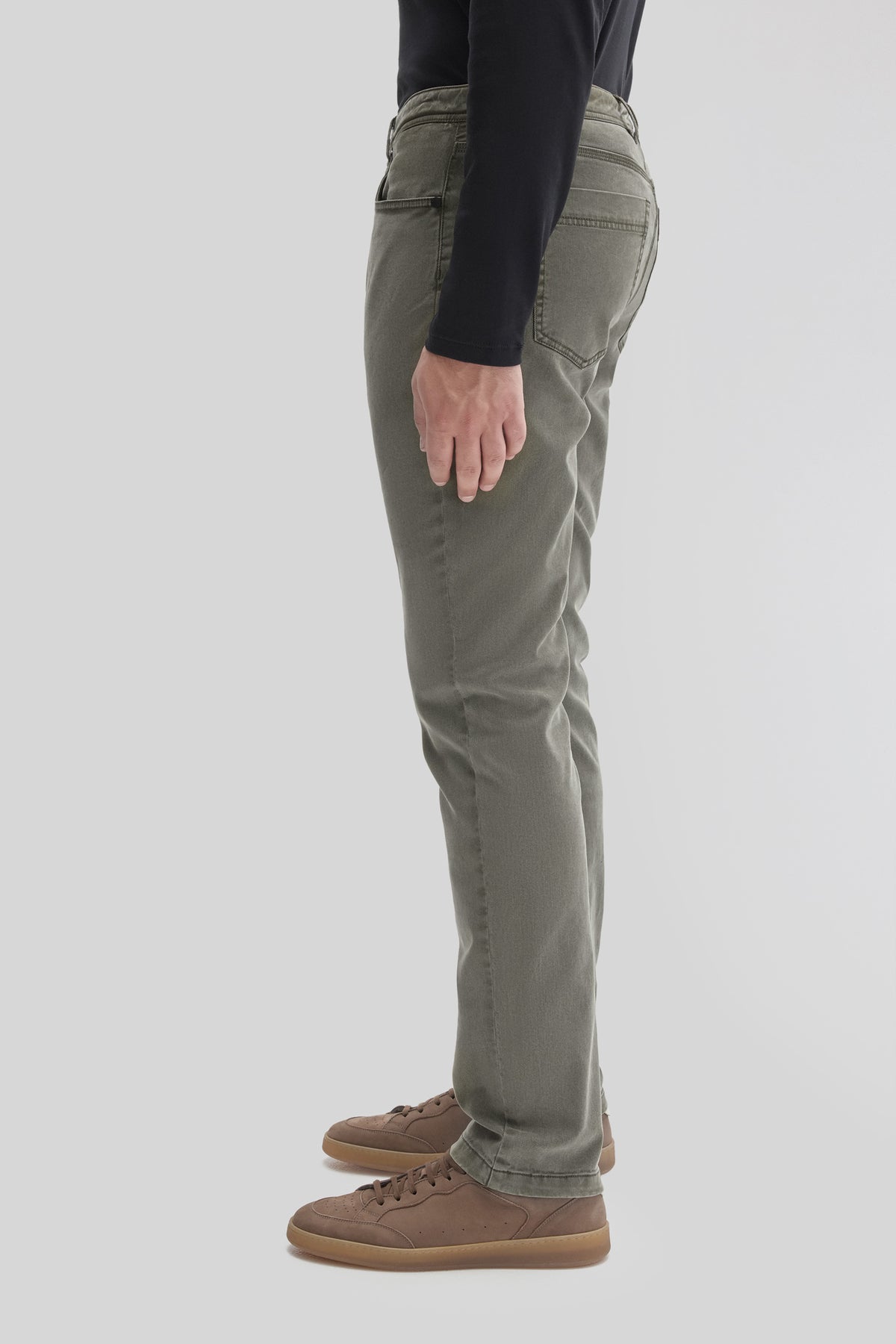 Sage green five-pocket pants shown from the side, featuring a straight leg and visible back pocket detail.
