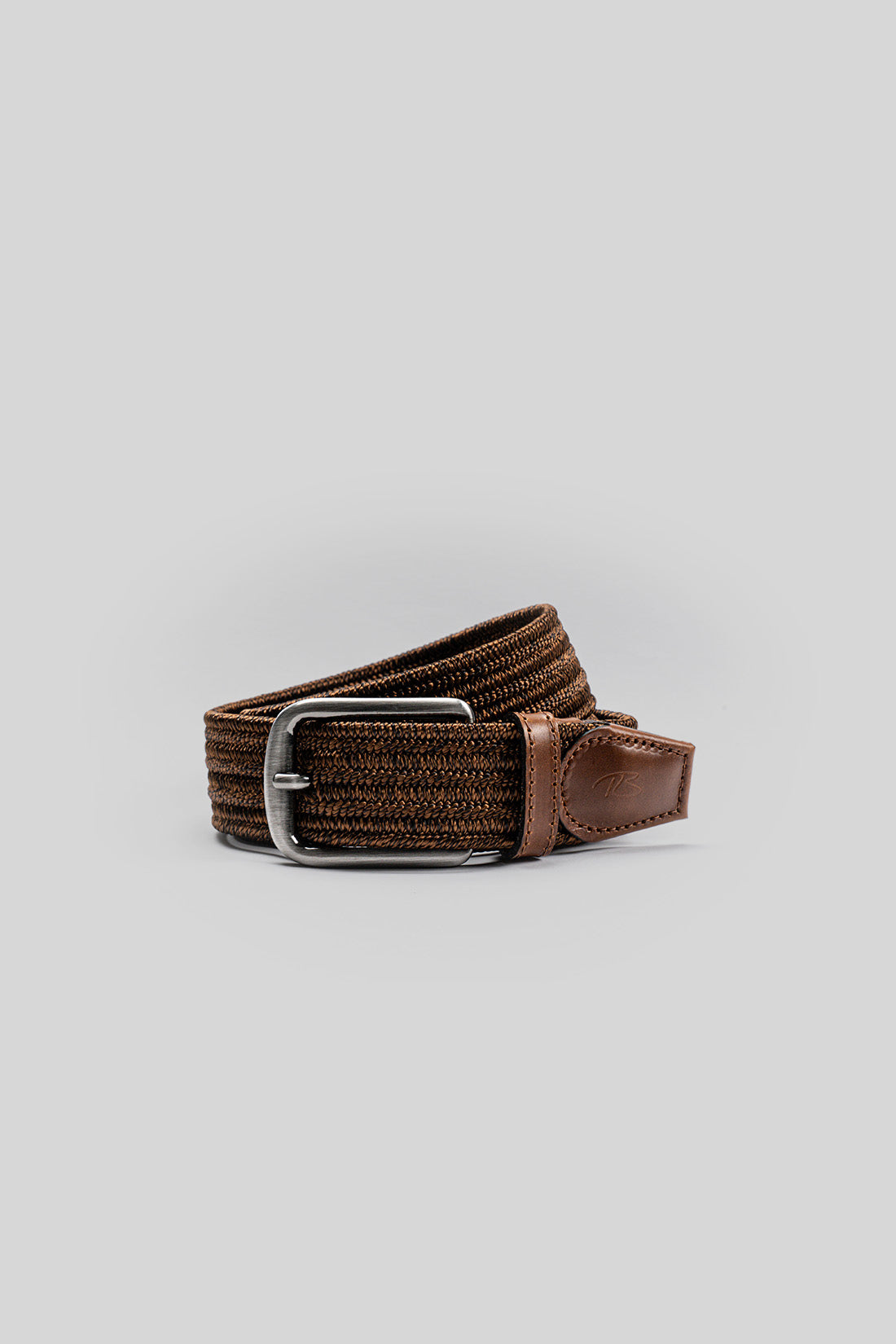 Brown woven fabric belt with leather trim and silver rectangular buckle.