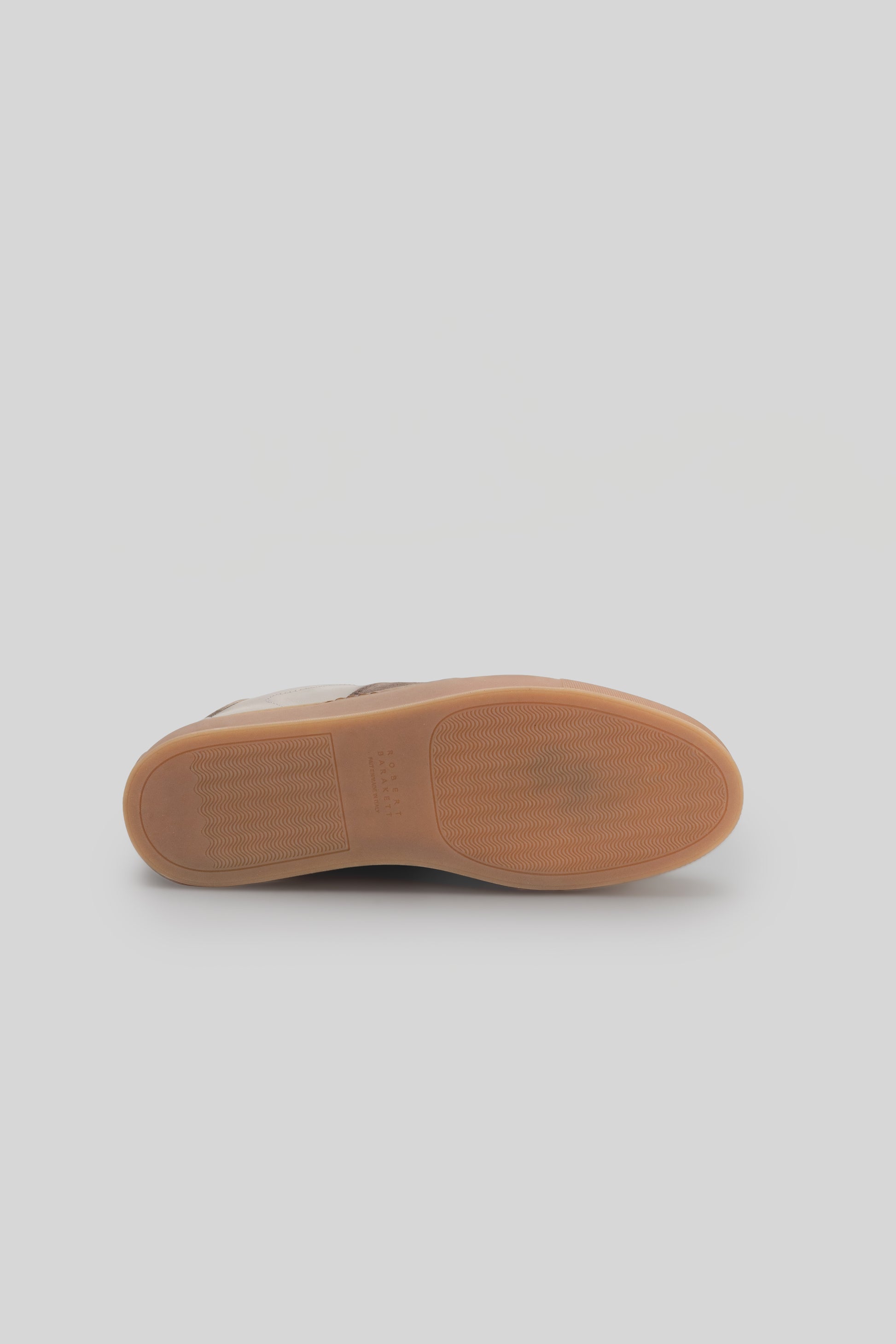 Bottom view of Dalton Stripe Sneaker showing tan rubber sole with tread pattern.